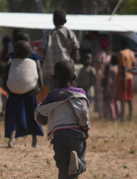Children run to greet the MAF plane during the annual ‘tournée médicale’ (medical tour).