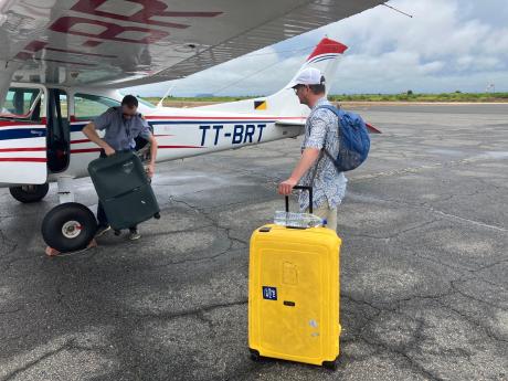 Erwin getting his luggage to the aircraft